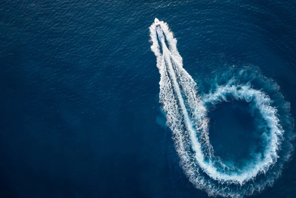 An aerial view of a motorboat.