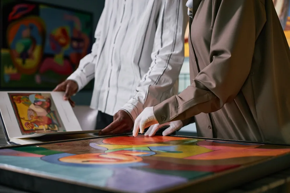 Person examining art closely