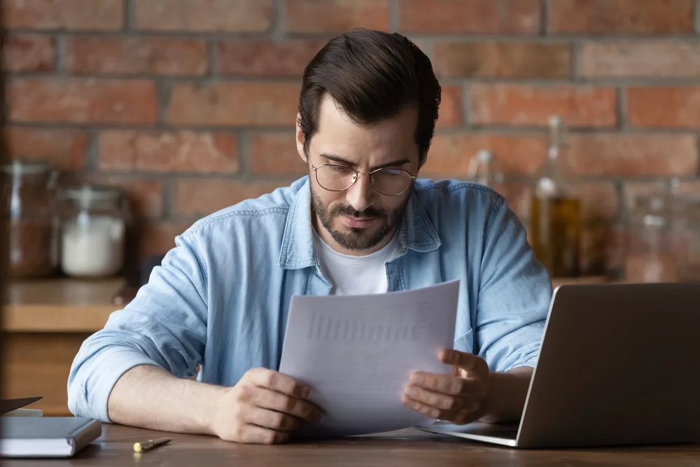 Landlord looking over rental property contract